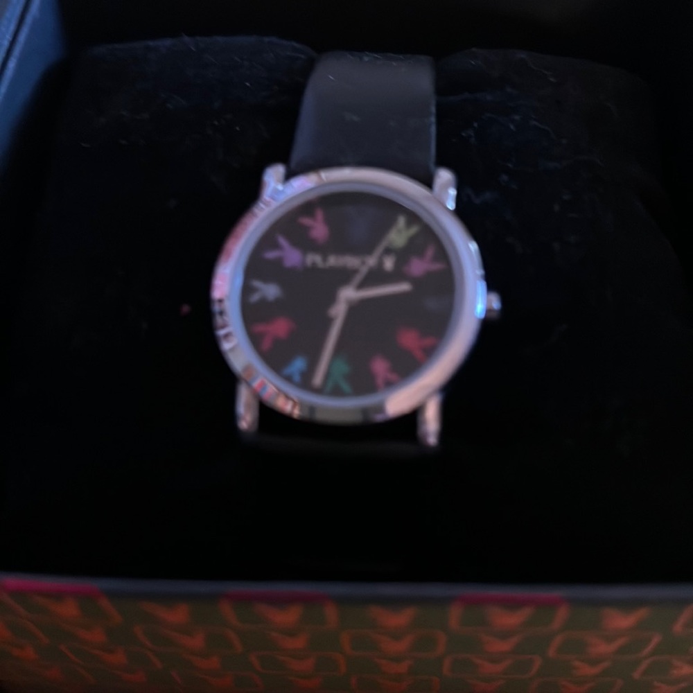 Playboy watch with price tag and box included